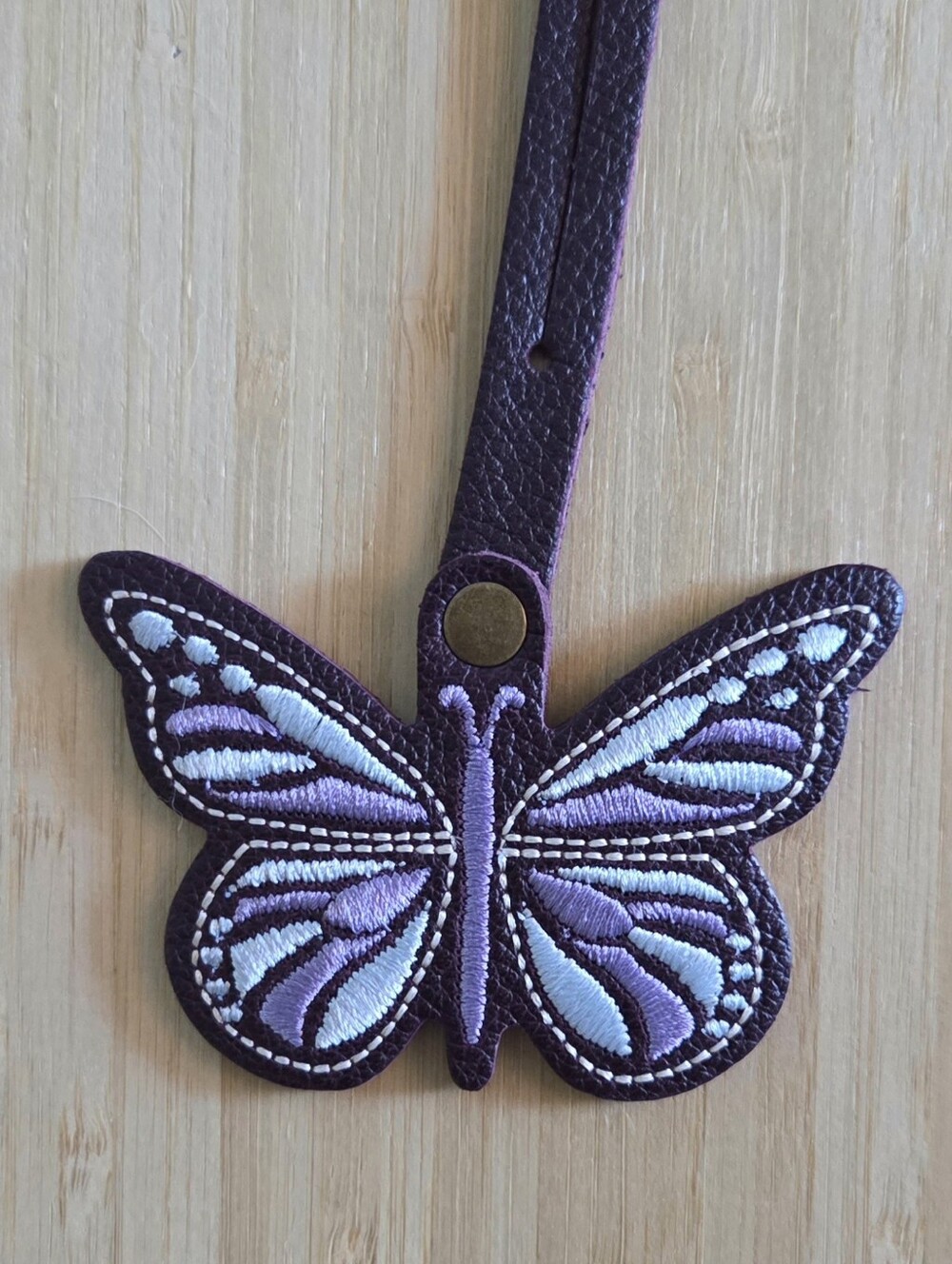 Portland Leather Monarca Butterfly Bag Charm Tassel in Plum